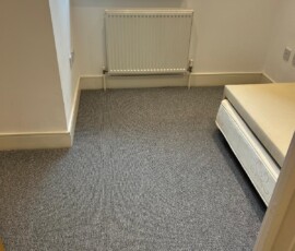 Quality craftsmanship and attention to detail in every project Finished laminate flooring installation in modern living room